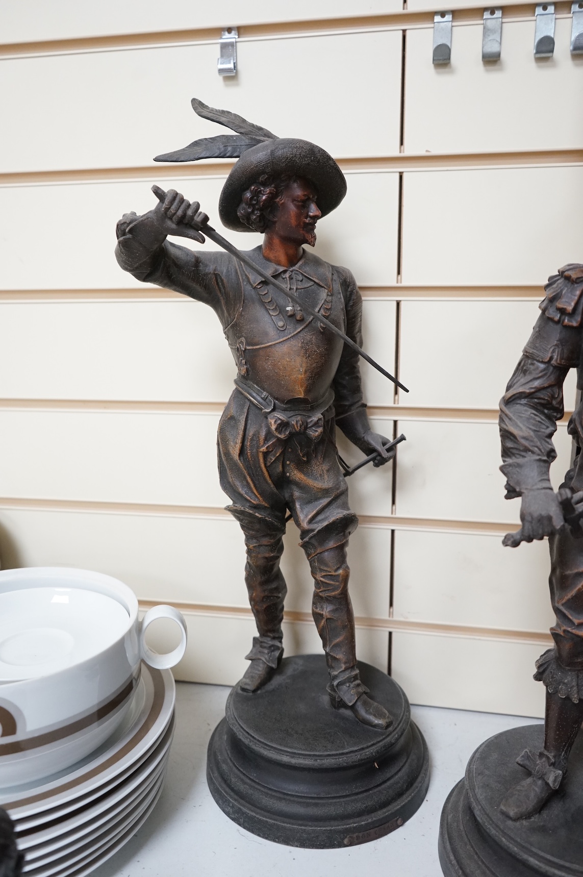 A pair of bronzed spelter figures, another pair of busts and a bronzed spelter group of a Cavalier and his horse, tallest 52cm